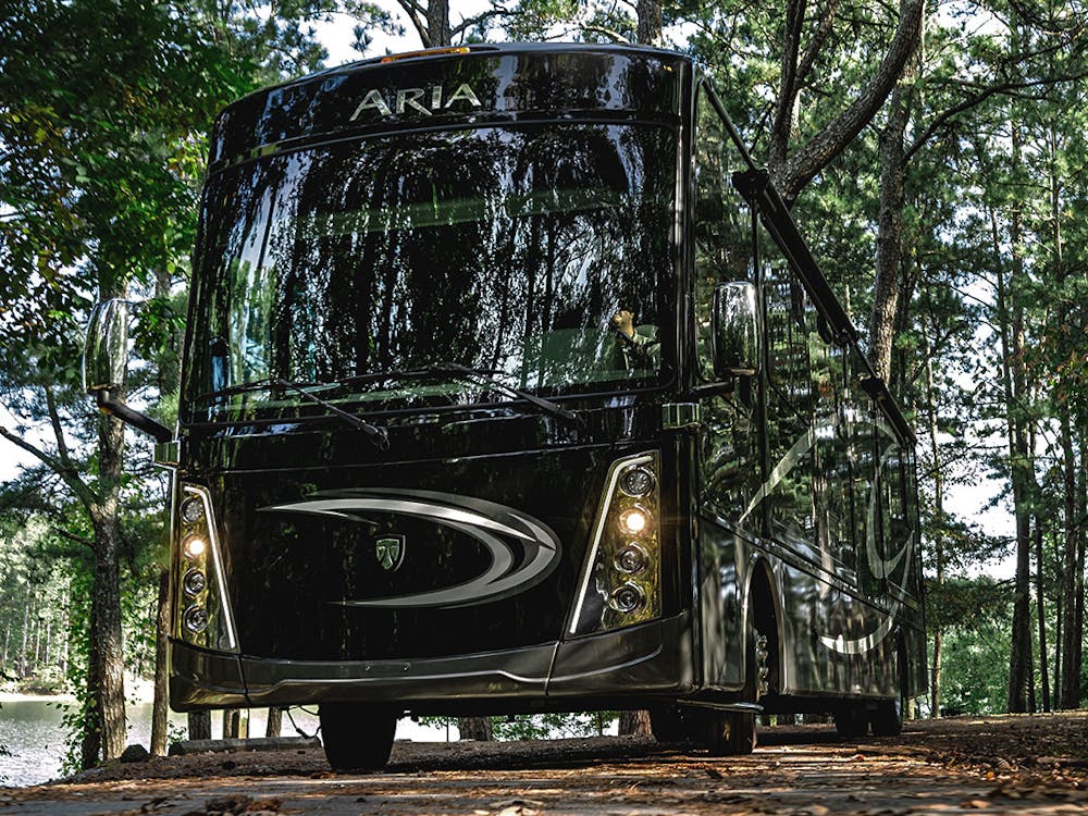 2021 Thor Aria Class A Diesel Pusher RV lifestyle corporate photo shoot driving shot