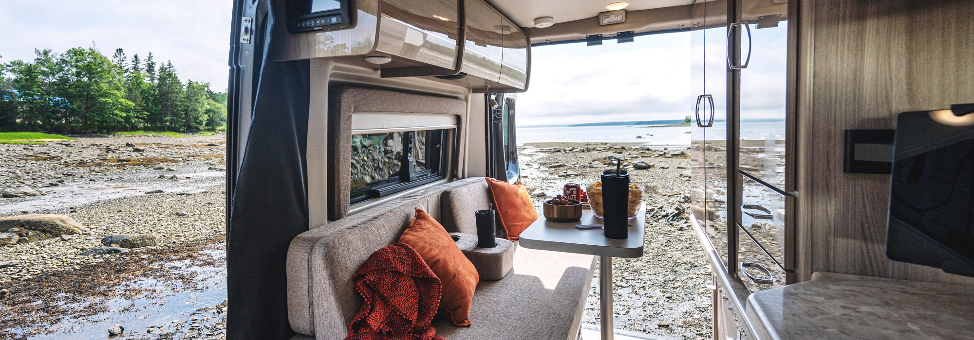 2022 Thor Scope Class B RV Camper Van Lifestyle Maine Corporate photo shoot windows open inside and looking out at ocean slider size