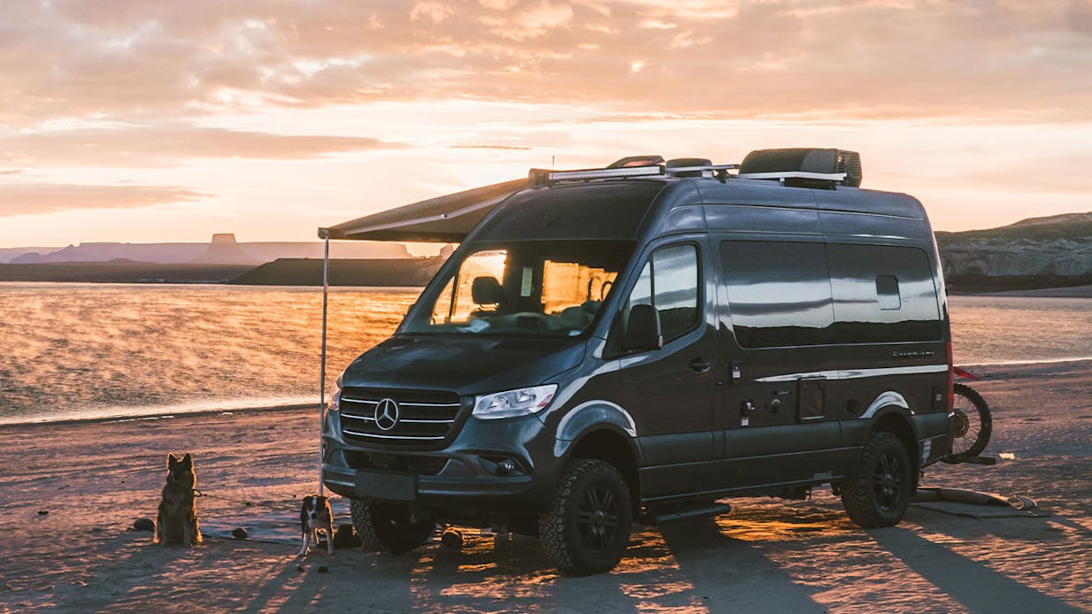 2022 Thor Sanctuary Mercedes Sprinter RV Camper Van Slider image dogs at campsite at sunset kalen thorien corporate photo shoot utah