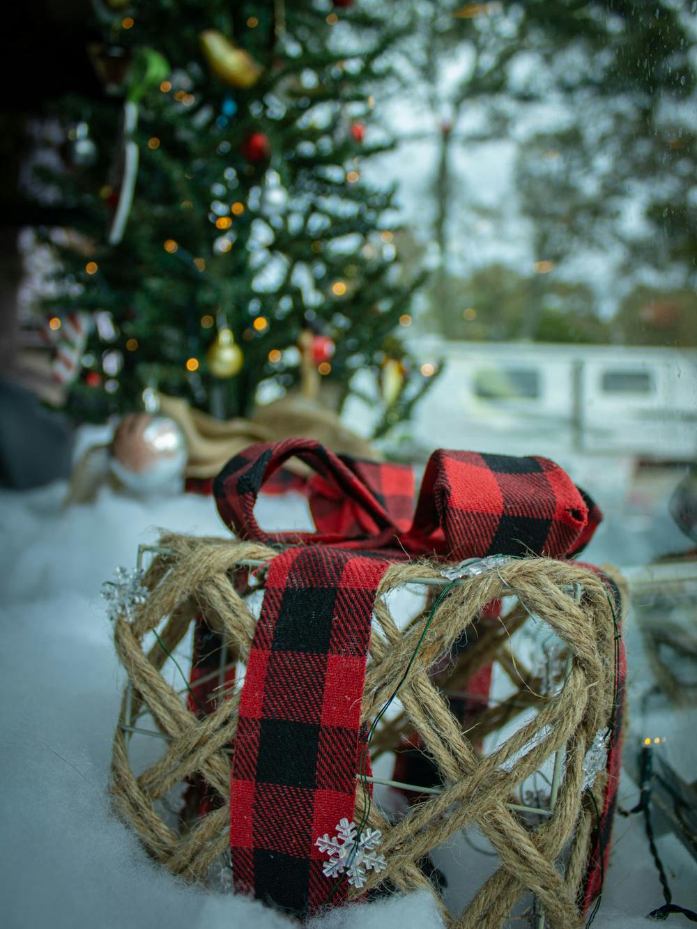 Blog photo Breaking Tradition - Hagen blog Christmas gift in the snow with RV behind in the background