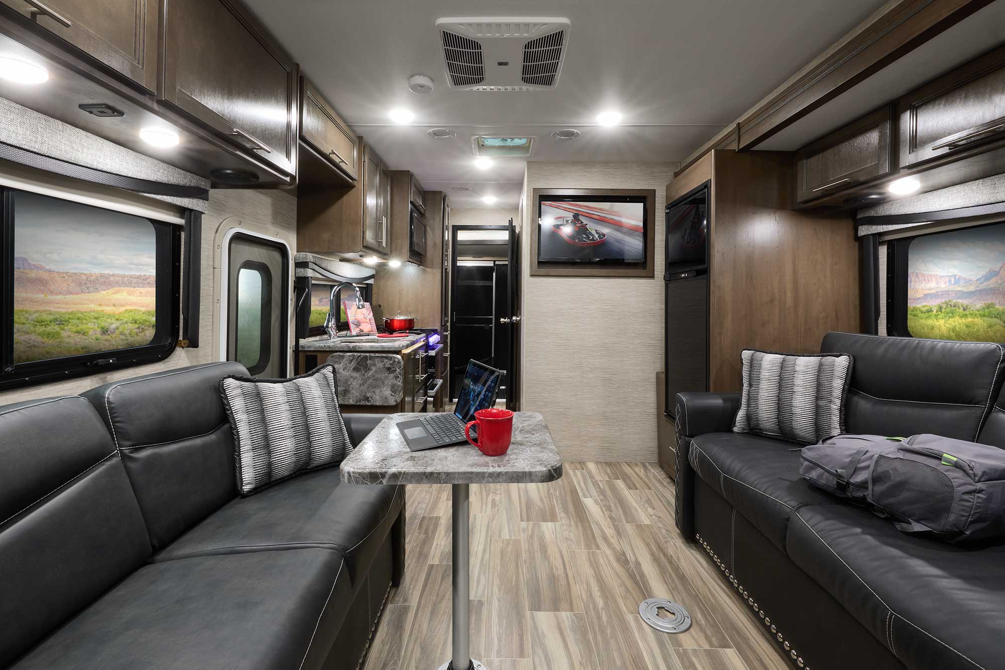 2022 Thor Outlaw Class C Toy Hauler RV 29J Front to Back - Midnight Special Carolina Cherry Cabinetry