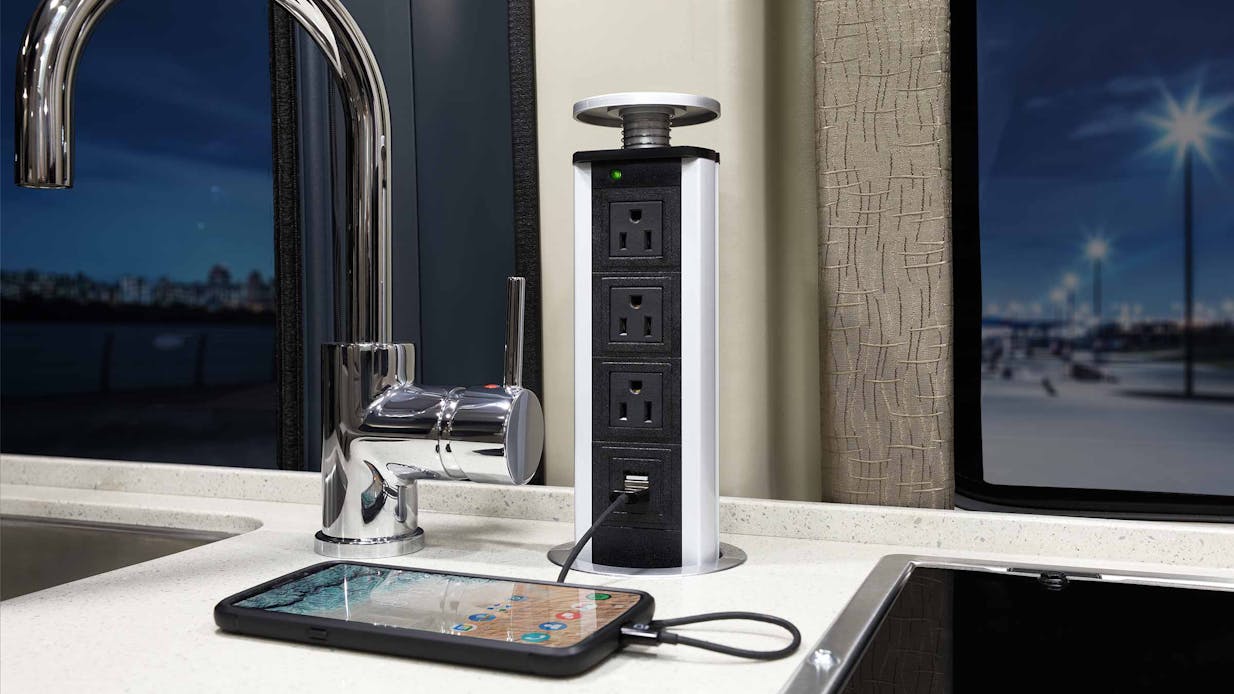 Pop up countertop outlet
