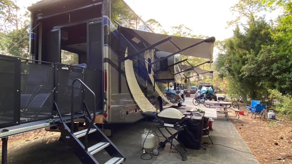 Blog Photo Phil V. Thor Outlaw Class A Toy Hauler RV exterior patio photo