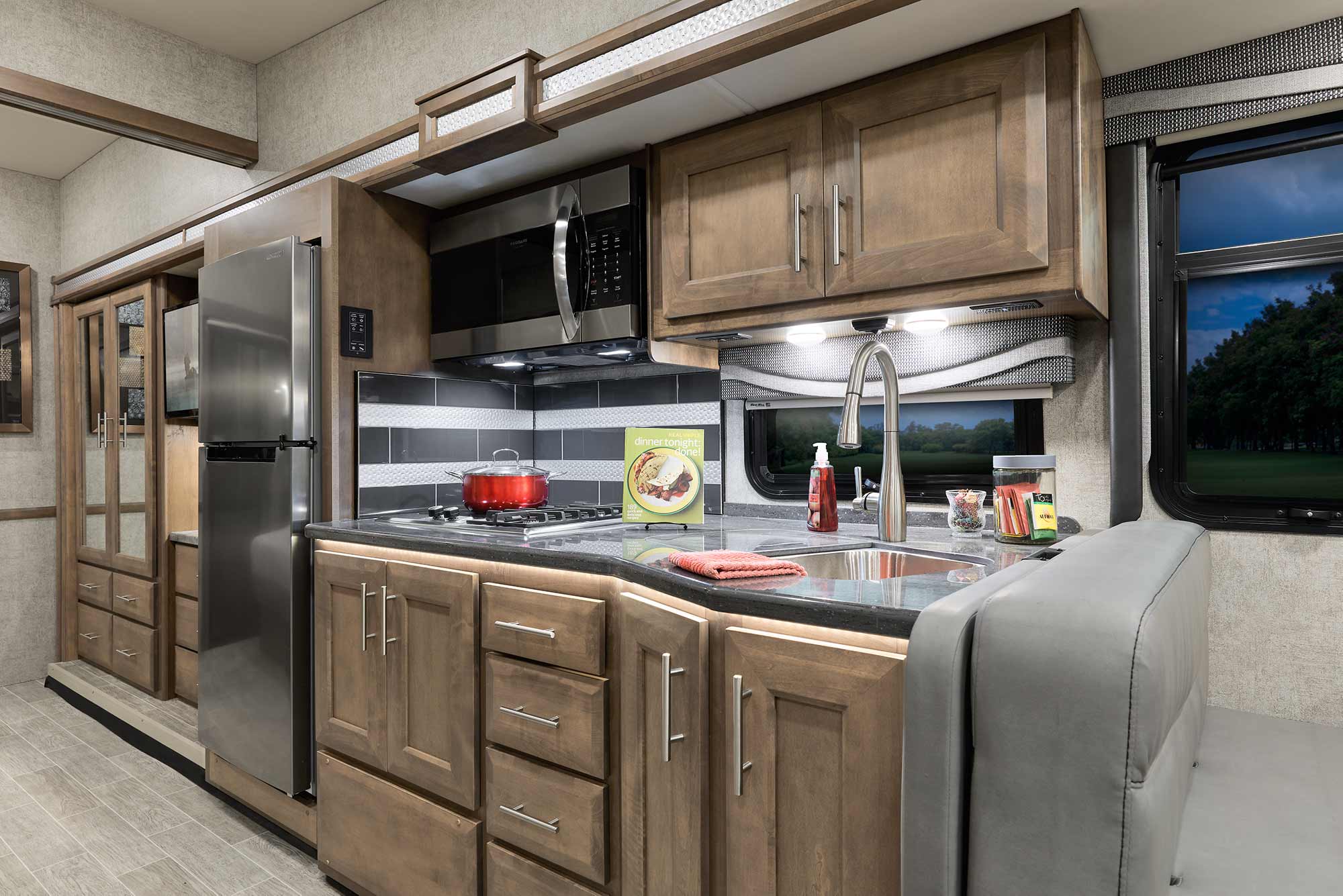 2022 Thor Outlaw Class A Toy Hauler RV 38MB Kitchen - Street Blues Sanibel Cabinetry