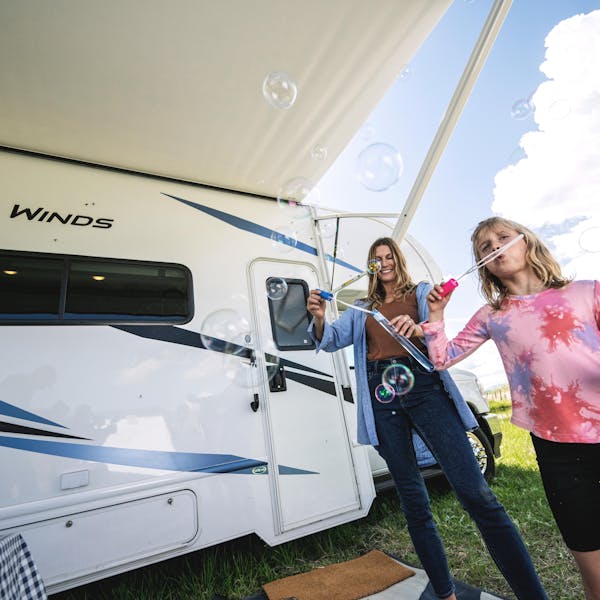 Four Winds class C with mom and daughter having family time