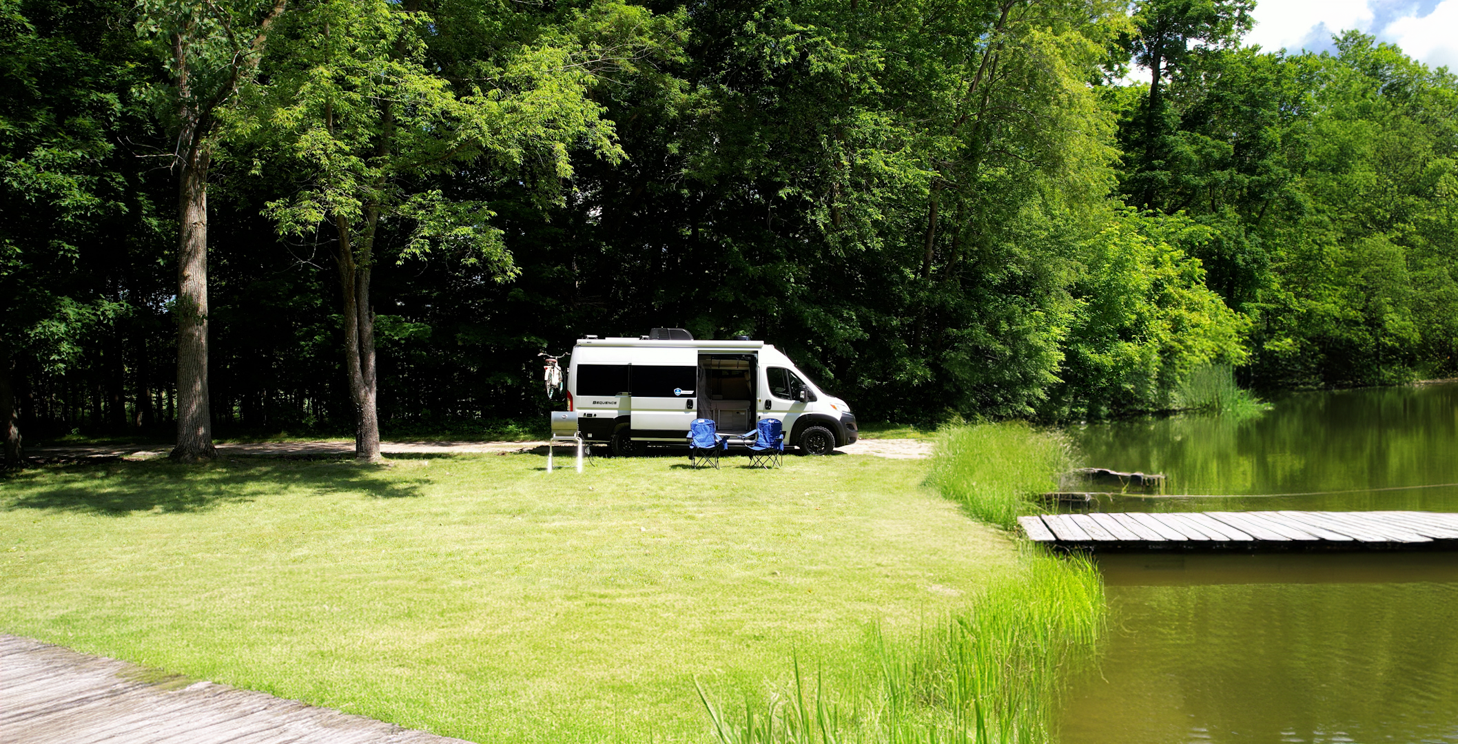 Sequence parked by lake class b van