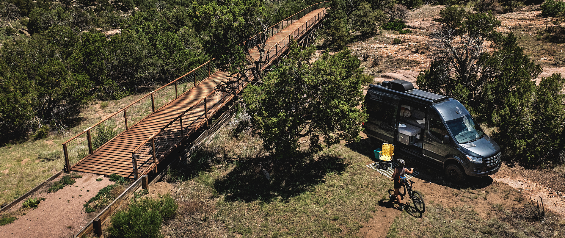 2025 Tranquility Sprinter in Colorado scenery by bridge