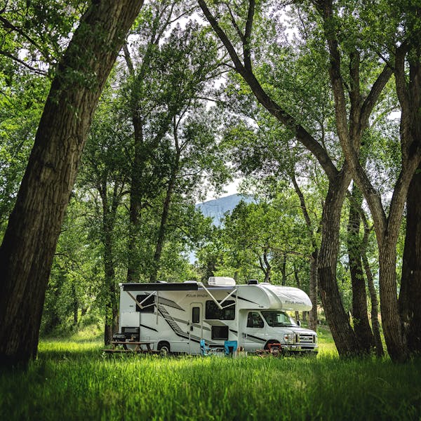 Class C Motorhome camping in woods