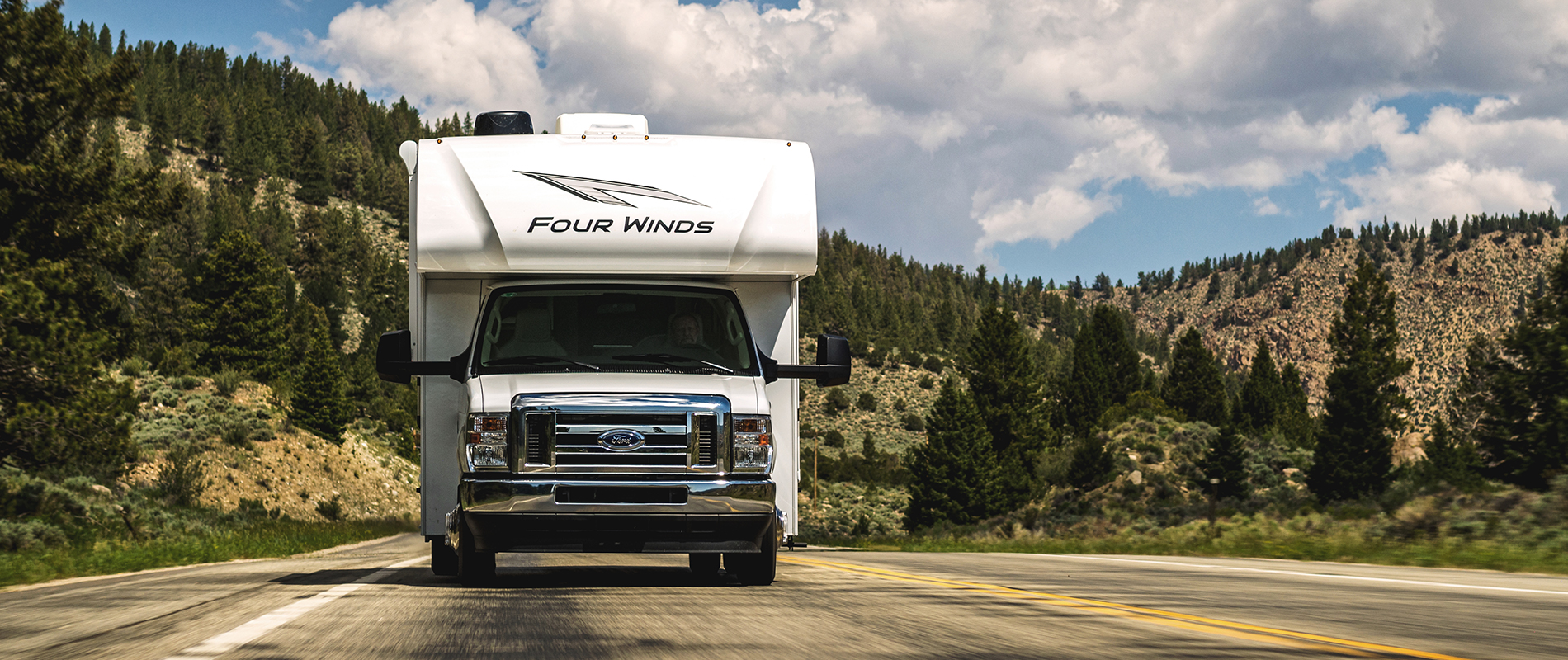 2025 Four Winds Class C RV driving in mountains