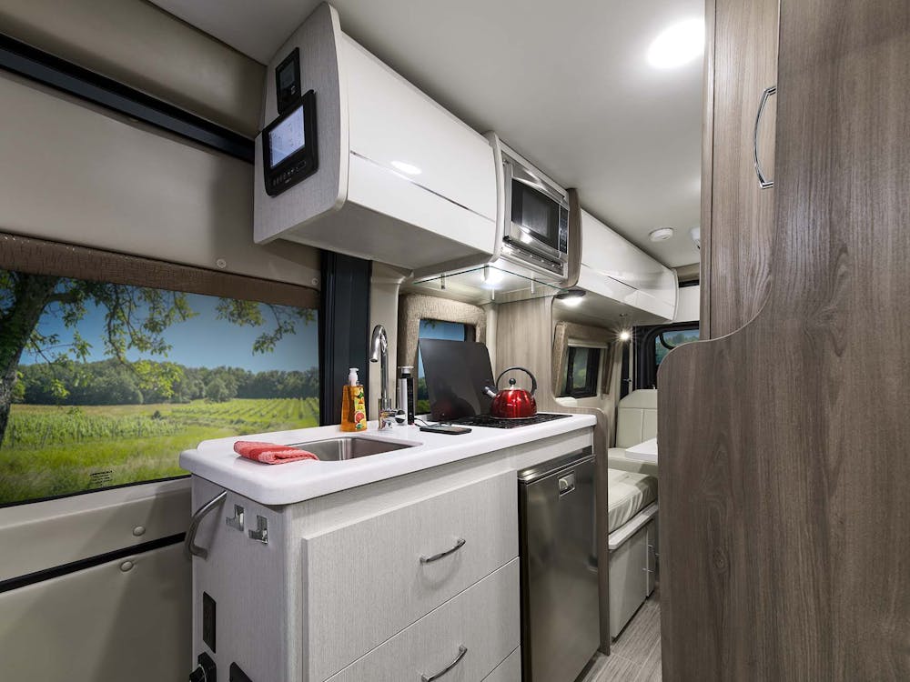 2022 Thor Tellaro Class B RV 20J Kitchen - Crisp Linen Modern White Cabinetry