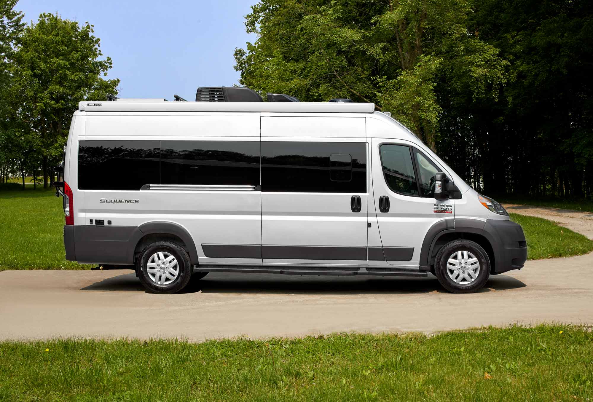 https://www.thormotorcoach.com/cms/images/f0598a47-5992-429b-a3e0-cf1b81140fc3_2022-Sequence-Paint-Silver-SideProfile-Window-Van-KF.jpg?auto=format%2Ccompress&h=500&rect=51%2C0%2C1898%2C1356&w=700