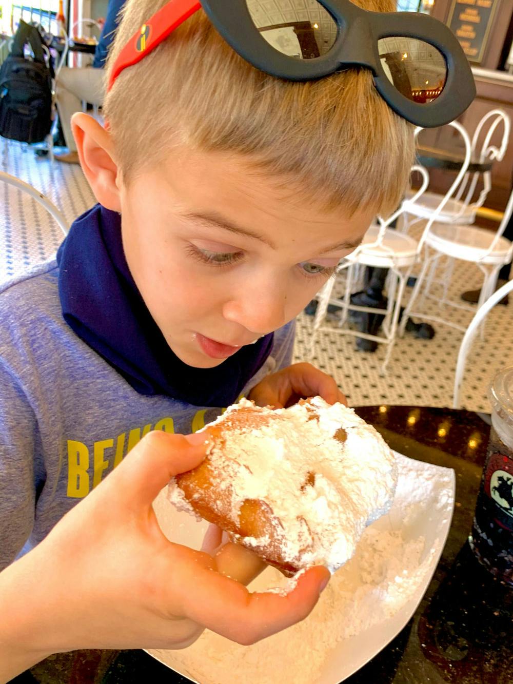 Blog Photo 7 Lessons Kids Learn Through RVing - Lou eating something new