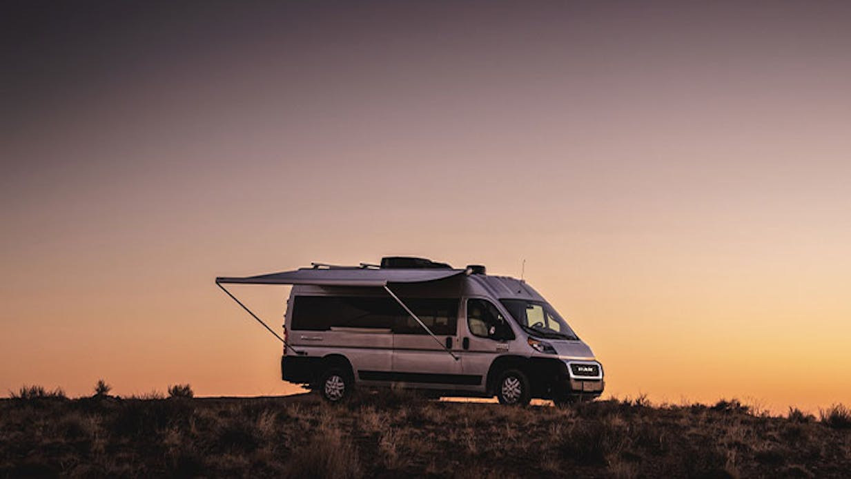 2021 Tellaro Class B Camper Van RV Lifestyle Exterior in Utah Corporate photo shoot sunset with awning extended