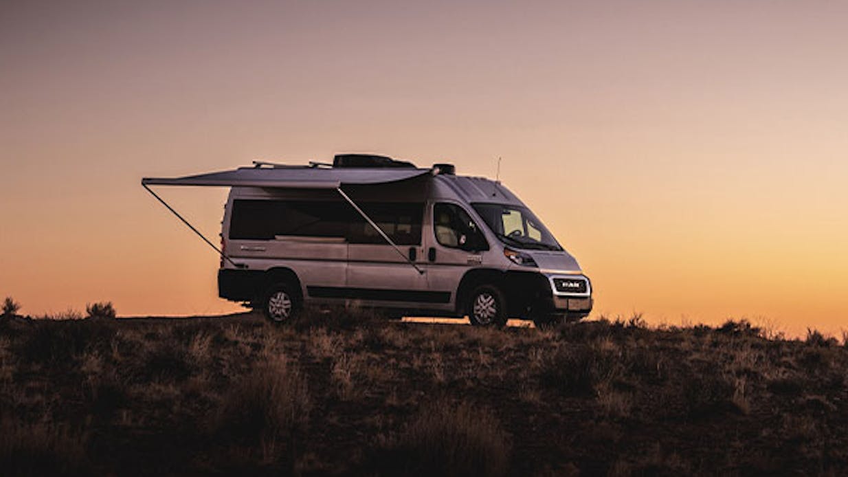 2021 Tellaro Class B Camper Van RV Lifestyle Exterior in Utah Corporate photo shoot sunset with awning extended