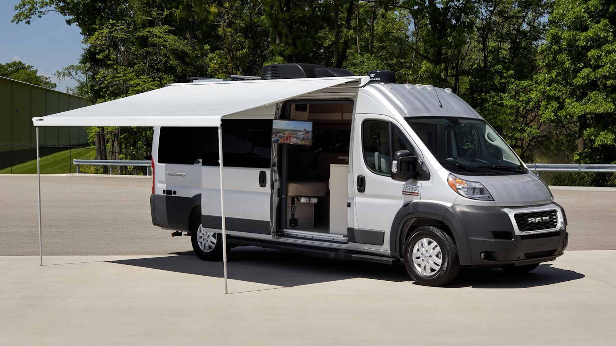 2022 Tellaro Class B Camper Van RV Silver Full Body Paint Exterior Thule® Awning extended lifestyle