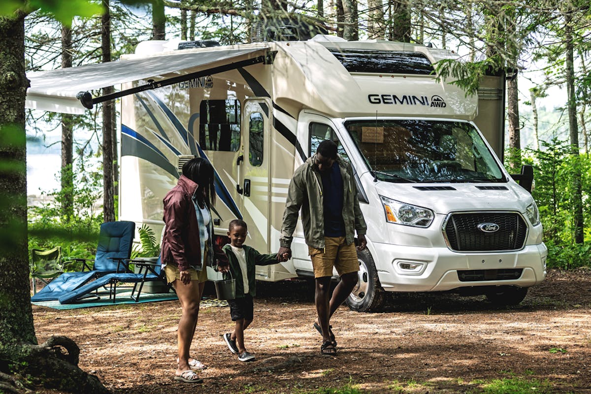 2022 Thor Gemini Class B RV Lifestyle Maine Corporate photo shoot outdoors trees and family walking